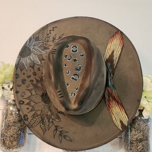 Stylish Dark Green Hat with Artistic Design